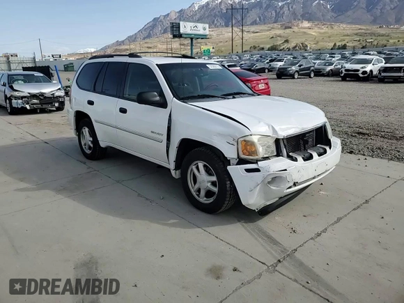 2006 GMC Envoy SLE z VIN 1GKDT13S462156541, wystawiony jako Copart lot #52500615 z przebiegiem 140 558 mil mil oraz Szkody całkowita. Historia ofert i sprzedaży dostępna na DreamBid. Obrazek 11.