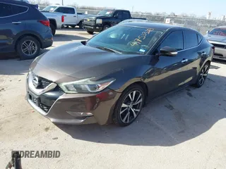 2016 Nissan Maxima Platinum with VIN 1N4AA6AP2GC385723, listed as a IAAI auction lot 41753328 with 162,845 mi miles and . Bid and sale history available at DreamBid. Image 17.