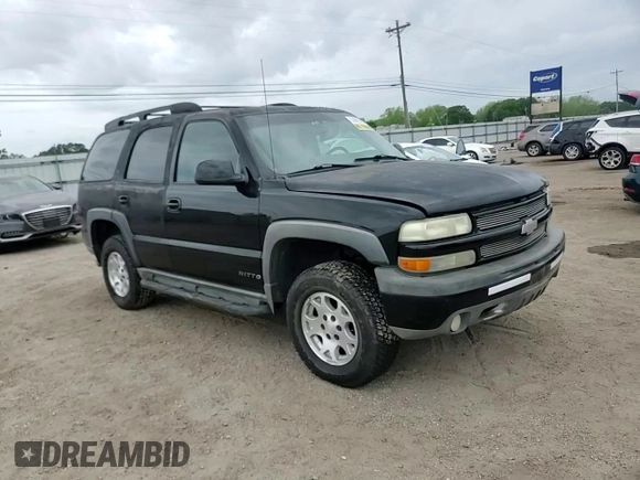 2003 Chevrolet Tahoe Z71 z VIN 1GNEK13Z13R301464, wystawiony jako Copart lot #53905395 z przebiegiem 165 360 mil mil oraz Szkoda całkowita • Salvage title. Historia ofert i sprzedaży dostępna na DreamBid. Obrazek 14.