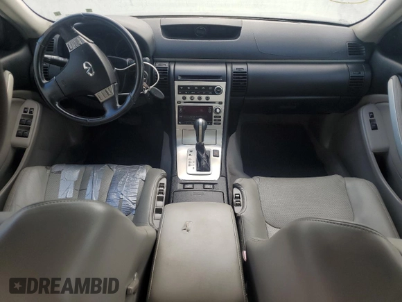 2006 Infiniti G35 z VIN JNKCV51F56M605484, wystawiony jako Copart lot #76721034 z przebiegiem 214 171 mil mil oraz Czysty tytuł • Clean title. Historia ofert i sprzedaży dostępna na DreamBid. Obrazek 8.