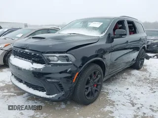 2023 Dodge Durango SRT 392 Premium with VIN 1C4SDJGJXPC681939, listed as a IAAI auction lot 41015100 with 12,562 mi miles and . Bid and sale history available at DreamBid. Image 2.