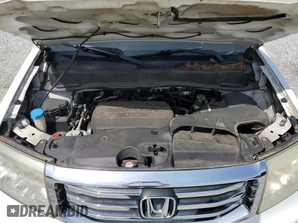 2013 Honda Pilot EX-L z VIN 5FNYF4H71DB057695, wystawiony jako Copart lot #51253785 z przebiegiem 147 701 mil mil oraz Szkoda całkowita • Salvage title. Historia ofert i sprzedaży dostępna na DreamBid. Obrazek 12.