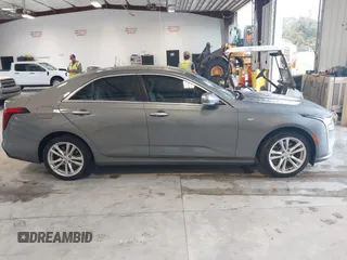 2021 Cadillac CT4 Luxury with VIN 1G6DA5RK4M0147723, listed as a IAAI auction lot 41646082 with 14,459 mi miles and . Bid and sale history available at DreamBid. Image 13.