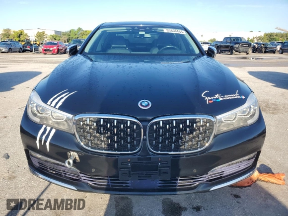 2017 BMW 7 Series 740i xDrive with VIN WBA7E4C34HGU99964, listed as a Copart auction lot 69808464 with 93,423 mi miles and Non Repairable. Bid and sale history available at carsss.com. Image 5.