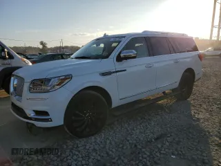2021 Lincoln Navigator Black Label z VIN 5LMJJ3TT5MEL00238, wystawiony jako Copart lot #76951964 z przebiegiem 69 712 mil mil oraz Szkoda całkowita • Salvage title. Historia ofert i sprzedaży dostępna na DreamBid. Obrazek 1.