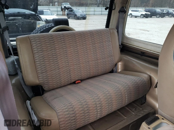 1999 Jeep Wrangler Sahara with VIN 1J4FY49S1XP409859, listed as a Copart auction lot 85006954 with 145,860 mi miles and Clean Title. Bid and sale history available at carsss.com. Image 10.