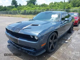 2016 Dodge Challenger SXT with VIN 2C3CDZAG4GH245251, listed as a IAAI auction lot 42650173 with 133,670 mi miles and . Bid and sale history available at DreamBid. Image 2.