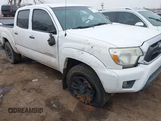2015 Toyota Tacoma with VIN 5TFLU4EN5FX118378, listed as a IAAI auction lot 41609943 with 121,640 mi miles and . Bid and sale history available at DreamBid. Image 1.