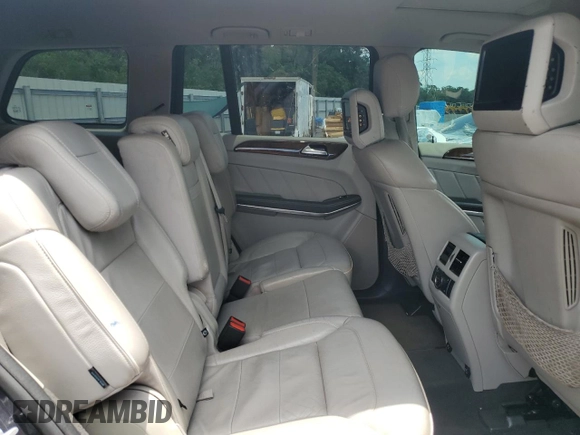 2014 Mercedes-Benz GL 450 z VIN 4JGDF7CE0EA303471, wystawiony jako Copart lot #58673045 z przebiegiem 182 455 mil mil oraz Tytuł czysty. Historia ofert i sprzedaży dostępna na DreamBid. Obrazek 11.