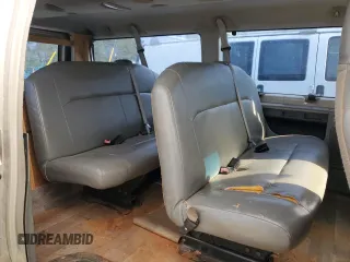 2010 Ford Econoline Passenger XL with VIN 1FMNE1BWXADA30935, listed as a Copart auction lot 77912734 with 153,775 mi miles and Salvage Title. Bid and sale history available at DreamBid. Image 10.