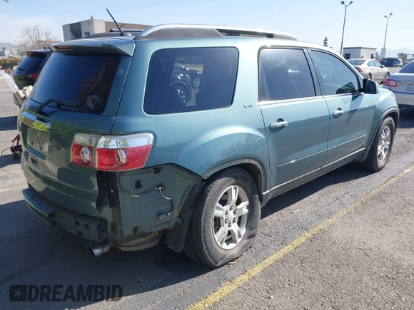 2009 GMC Acadia SLT1 with VIN 1GKER23D79J139611, listed as a IAAI auction lot 41969438 with 133,596 mi miles. Bid and sale history available at carsss.com. Image 4.