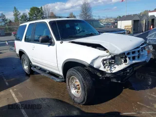 1999 Ford Explorer Sport z VIN 1FMYU22X2XUA33545, wystawiony jako IAAI lot #41818348 z przebiegiem 130 848 mil mil oraz . Historia ofert i sprzedaży dostępna na DreamBid. Obrazek 1.