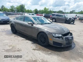 2012 Audi A7 Premium Plus with VIN WAUYGAFC1CN085666, listed as a IAAI auction lot 42177867 with 242,775 mi miles and . Bid and sale history available at DreamBid. Image 1.