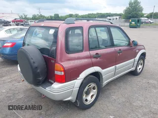 2000 Suzuki Grand Vitara JLX z VIN JS3TD62V7Y4119022, wystawiony jako IAAI lot #42384608 z przebiegiem 153 943 mil mil oraz . Historia ofert i sprzedaży dostępna na DreamBid. Obrazek 4.