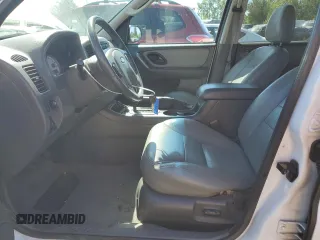 2005 Ford Escape XLT with VIN 1FMYU93135KA59180, listed as a Copart auction lot 69783974 with 126,255 mi miles and Salvage Title. Bid and sale history available at carsss.com. Image 7.