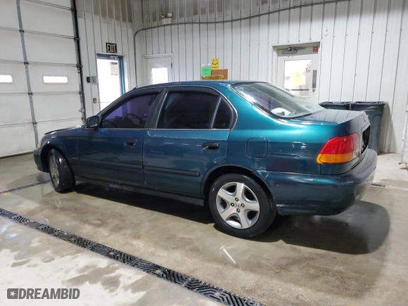 1997 Honda Civic LX with VIN 1HGEJ6572VL027980, listed as a Copart auction lot 53024335 with 269,396 mi miles and Salvage Title. Bid and sale history available at carsss.com. Image 2.