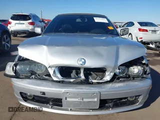 2003 BMW 3 Series 325Ci with VIN WBABS33413PG91828, listed as a IAAI auction lot 41513821 with 150,672 mi miles and . Bid and sale history available at DreamBid. Image 13.