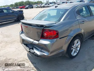 2012 Dodge Avenger SXT with VIN 1C3CDZCB9CN212328, listed as a IAAI auction lot 42360745 with 189,311 mi miles and . Bid and sale history available at DreamBid. Image 18.