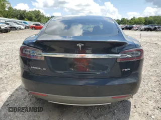 2013 Tesla Model S Performance с VIN 5YJSA1CP8DFP20786, выставлен на аукционе Copart как лот 61035395 с пробегом 140 119 миль миль и Списание • Salvage title. История ставок и продаж доступна на DreamBid. Изображение 6.