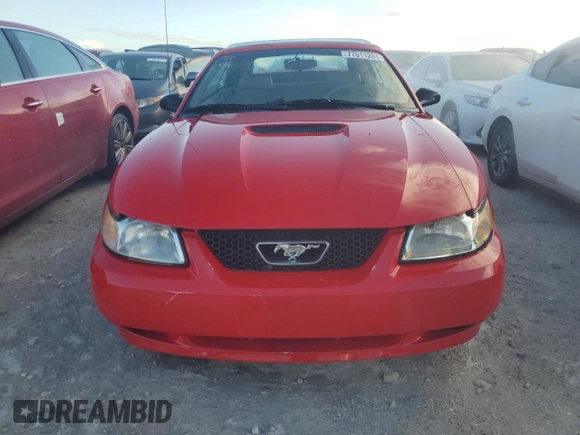 1999 Ford Mustang z VIN 1FAFP4443XF106725, wystawiony jako Copart lot #77011284 z przebiegiem Nie podano mil oraz Szkoda całkowita • Salvage title. Historia ofert i sprzedaży dostępna na DreamBid. Obrazek 5.