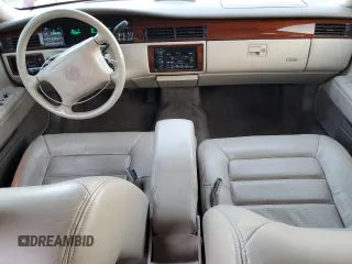 1994 Cadillac Concours z VIN 1G6KF52Y6RU201076, wystawiony jako Copart lot #44333975 z przebiegiem 70 265 mil mil oraz Szkody całkowita. Historia ofert i sprzedaży dostępna na DreamBid. Obrazek 8.