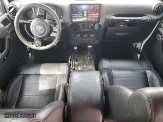 2012 Jeep Wrangler Unlimited Sahara with VIN 1C4BJWEG6CL256452, listed as a Copart auction lot 53305115 with 50,944 mi miles and Salvage Title. Bid and sale history available at carsss.com. Image 8.