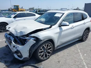 2020 BMW X1 xDrive28i with VIN WBXJG9C04L5R18165, listed as a IAAI auction lot 42313313 with 46,815 mi miles and . Bid and sale history available at DreamBid. Image 2.