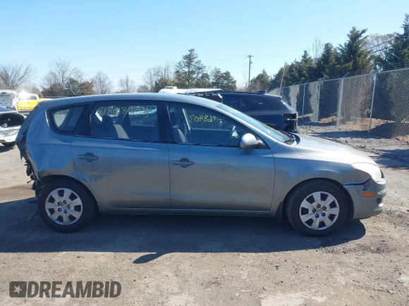 2011 Hyundai Elantra Touring GLS with VIN KMHDB8AE5BU089687, listed as a IAAI auction lot 41868403 with 231,671 mi miles. Bid and sale history available at carsss.com. Image 12.