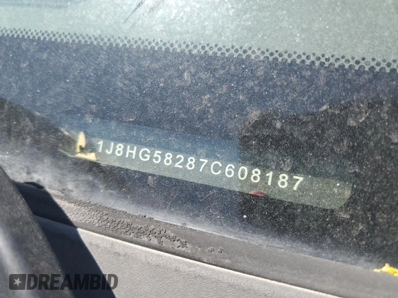 2007 Jeep Commander Limited with VIN 1J8HG58287C608187, listed as a Copart auction lot 52937855 with 163,456 mi miles and Salvage title. Bid and sale history available at DreamBid. Image 12.
