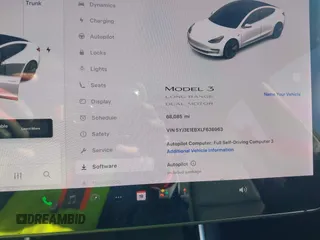 2020 Tesla Model 3 Long Range with VIN 5YJ3E1EBXLF636963, listed as a IAAI auction lot 41826249 with 68,085 mi miles. Bid and sale history available at carsss.com. Image 7.