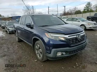 2017 Honda Ridgeline RTL with VIN 5FPYK3F57HB011597, listed as a Copart auction lot 49307885 with 140,157 mi miles and Salvage title. Bid and sale history available at DreamBid. Image 11.