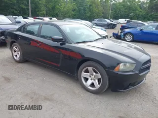 2014 Dodge Charger Police z VIN 2C3CDXAT7EH124745, wystawiony jako IAAI lot #42342829 z przebiegiem 90 568 mil mil oraz . Historia ofert i sprzedaży dostępna na DreamBid. Obrazek 1.