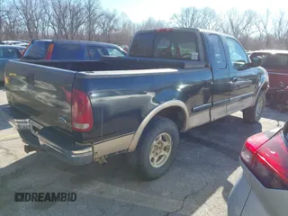 1998 Ford F-150 with VIN 1FTRX18L2WKA07312, listed as a IAAI auction lot 41327373 with 263,459 mi miles and . Bid and sale history available at DreamBid. Image 4.