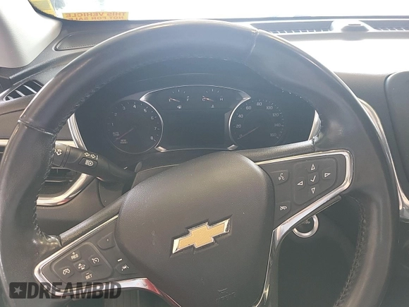 2020 Chevrolet Equinox LT with VIN 2GNAXJEV0L6236404, listed as a IAAI auction lot 42619695 with 77,124 mi miles and . Bid and sale history available at DreamBid. Image 3.