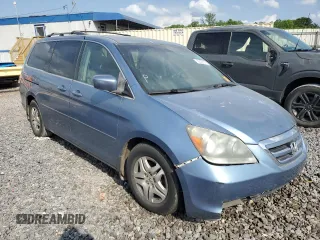2005 Honda Odyssey EX-L z VIN 5FNRL38685B092279, wystawiony jako Copart lot #57452175 z przebiegiem Nie podano mil oraz Szkoda całkowita • Salvage title. Historia ofert i sprzedaży dostępna na DreamBid. Obrazek 4.