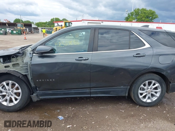 2021 Chevrolet Equinox LT z VIN 3GNAXUEV6ML302677, wystawiony jako IAAI lot #42327086 z przebiegiem 142 746 mil mil oraz . Historia ofert i sprzedaży dostępna na DreamBid. Obrazek 15.