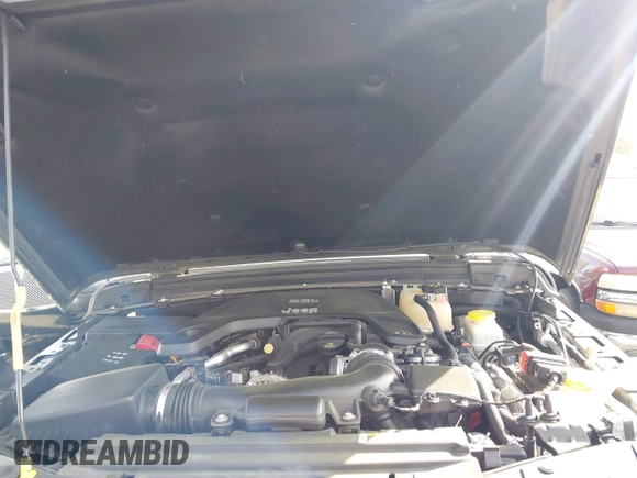 2019 Jeep Wrangler Unlimited Sport Altitude with VIN 1C4HJXDG3KW639148, listed as a IAAI auction lot 41933844 with 57,184 mi miles and . Bid and sale history available at DreamBid. Image 10.