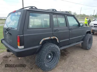1997 Jeep Cherokee Sport with VIN 1J4FJ68S0VL576171, listed as a IAAI auction lot 42588055 with 212,360 mi miles and . Bid and sale history available at DreamBid. Image 4.