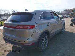 2015 Lincoln MKC z VIN 5LMCJ1A93FUJ26649, wystawiony jako IAAI lot #41832976 z przebiegiem 215 692 mil mil oraz . Historia ofert i sprzedaży dostępna na DreamBid. Obrazek 4.