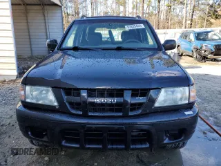 2003 Isuzu Rodeo with VIN 4S2CK58W334306303, listed as a Copart auction lot 83820444 with 180,040 mi miles and Salvage Title. Bid and sale history available at DreamBid. Image 5.