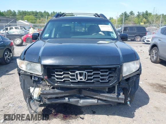 2010 Honda Ridgeline RTL z VIN 5FPYK1F56AB003730, wystawiony jako IAAI lot #42255351 z przebiegiem 190 630 mil mil oraz . Historia ofert i sprzedaży dostępna na DreamBid. Obrazek 12.