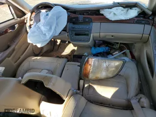 2005 Cadillac DeVille with VIN 1G6KD54Y65U167802, listed as a Copart auction lot 86577174 with 0 mi miles and Salvage Title. Bid and sale history available at carsss.com. Image 8.