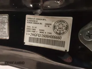 2006 Honda Civic Cpe LX with VIN 2HGFG12606H006660, listed as a IAAI auction lot 41813548 with 122,398 mi miles. Bid and sale history available at carsss.com. Image 9.