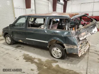 1993 Dodge Caravan Grand SE with VIN 1B4GH44R2PX757679, listed as a Copart auction lot 43034645 with 311,322 mi miles and Salvage Title. Bid and sale history available at carsss.com. Image 2.