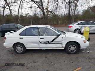 1996 Nissan Sentra XE z VIN 1N4AB41D0TC763104, wystawiony jako IAAI lot #41303640 z przebiegiem 307 682 mil mil oraz . Historia ofert i sprzedaży dostępna na DreamBid. Obrazek 13.