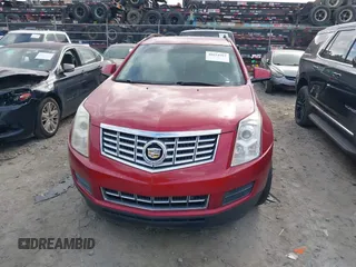 2015 Cadillac SRX z VIN 3GYFNAE3XFS572970, wystawiony jako IAAI lot #40854902 z przebiegiem 124 779 mil mil oraz . Historia ofert i sprzedaży dostępna na DreamBid. Obrazek 11.