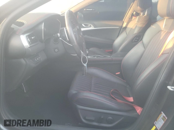 2023 Genesis G70 2.0T with VIN KMTG34TA4PU104352, listed as a Copart auction lot 76000484 with 27,548 mi miles and Salvage Title. Bid and sale history available at DreamBid. Image 7.