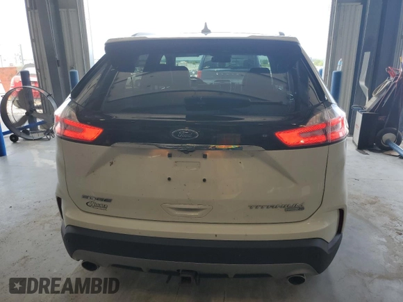 2020 Ford Edge Titanium z VIN 2FMPK4K98LBA31927, wystawiony jako Copart lot #58769015 z przebiegiem 40 609 mil mil oraz Szkoda całkowita • Salvage title. Historia ofert i sprzedaży dostępna na DreamBid. Obrazek 6.