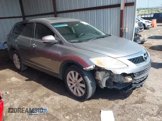 2010 Mazda CX-9 Grand Touring with VIN JM3TB2MA1A0220472, listed as a IAAI auction lot 42540760 with 246,804 mi miles and . Bid and sale history available at DreamBid. Image 1.