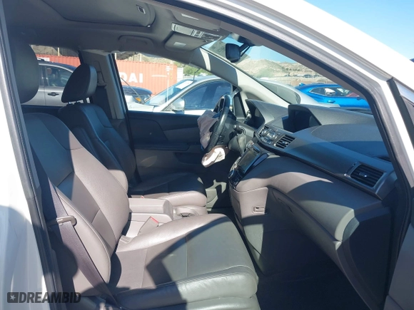 2016 Honda Odyssey EX-L with VIN 5FNRL5H65GB055916, listed as a IAAI auction lot 41980339 with 87,497 mi miles. Bid and sale history available at carsss.com. Image 5.